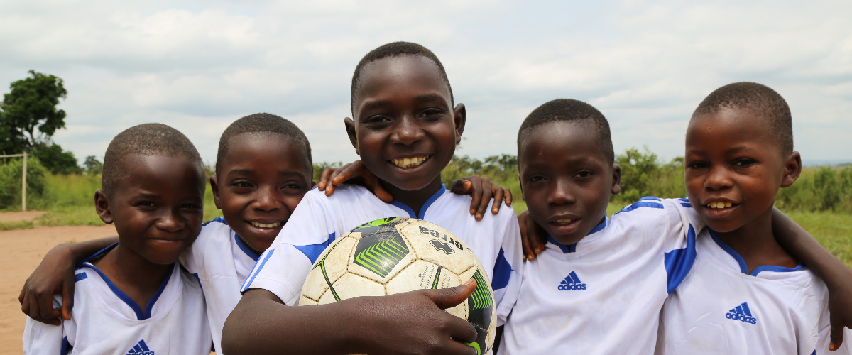 Musimbwa, 12, with his friends