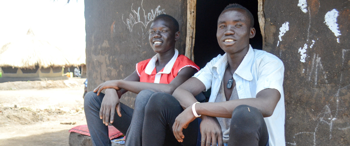 Simon and Isaac have been through a huge amount in their young lives, but now living in a refugee camp in Uganda, they're beginning to rebuild their lives. 