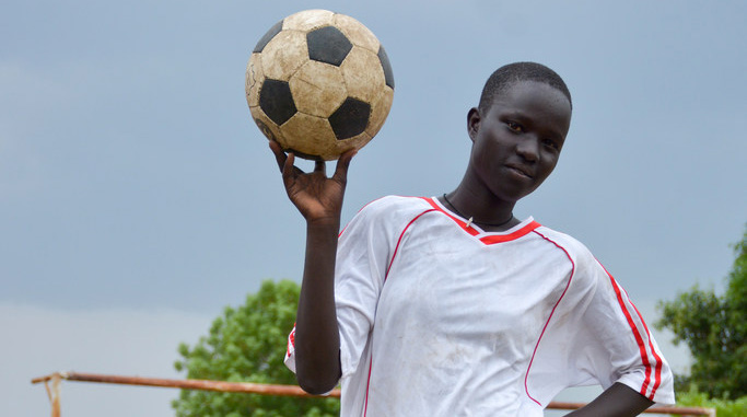 Margaret is a midfielder who plays football with her friends.