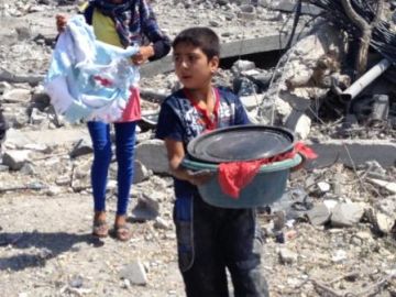 Boy-In-Rubble-Gaza.jpg